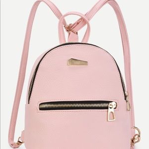 mini pink backpack